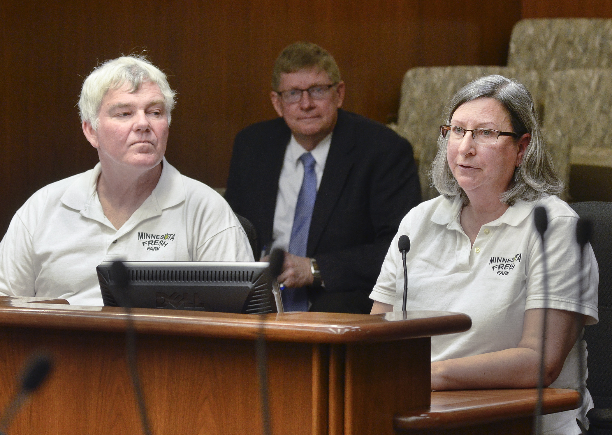 Bruce and Sharon Johnson, who run Minnesota Fresh Farm in East Bethel, testify in support of a bill that would provide agritourism activities liability immunity. Rep. Paul Anderson, center, sponsors the bill. Photo by Andrew VonBank.